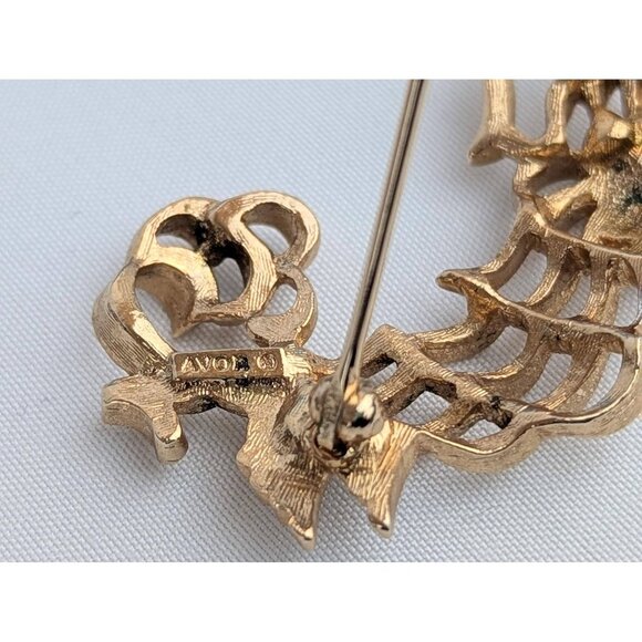 Vintage Avon Gold Tone Dog Brooch Pin 1970s Openwork Puppy Pin Green Rhinestones - Picture 6 of 6